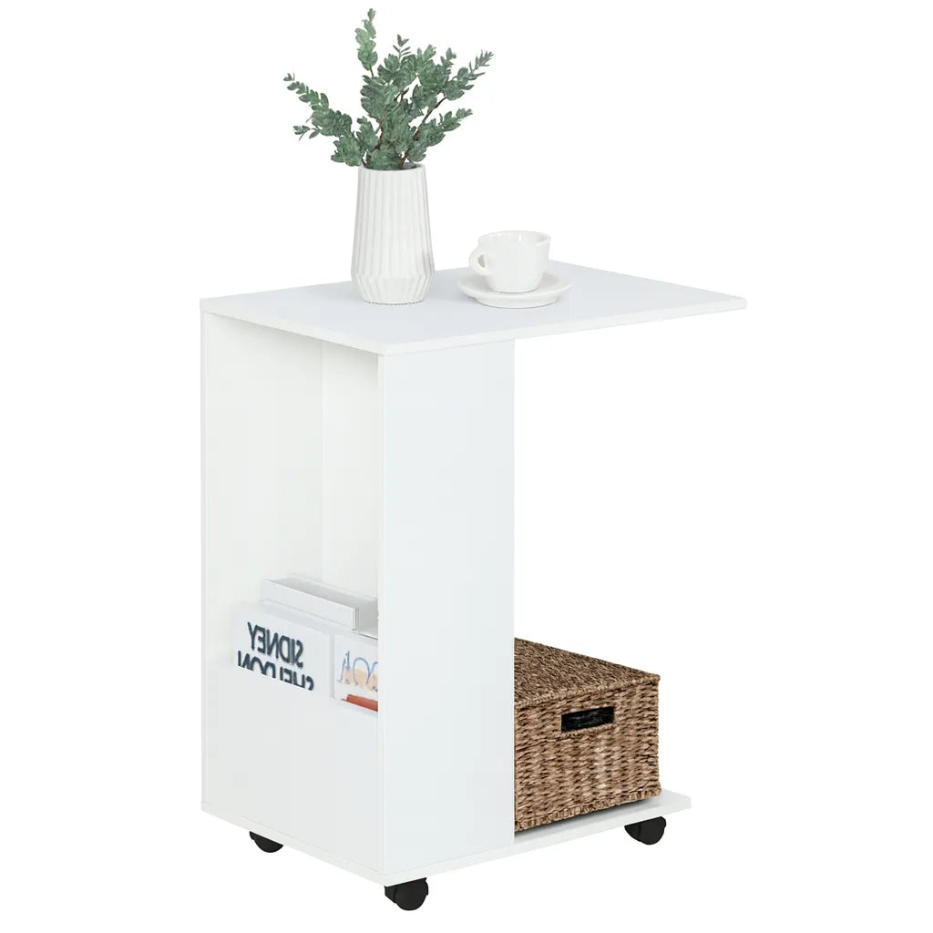 White side table with a basket, books, and a vase on a white background