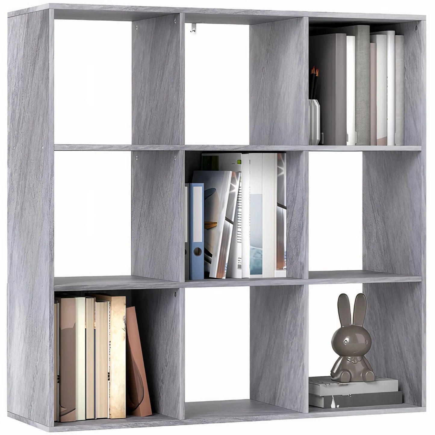 Gray wooden bookshelf with books and a rabbit figurine on white background