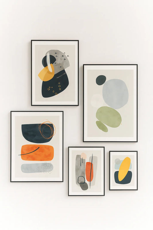 Set of abstract art prints on a white wall