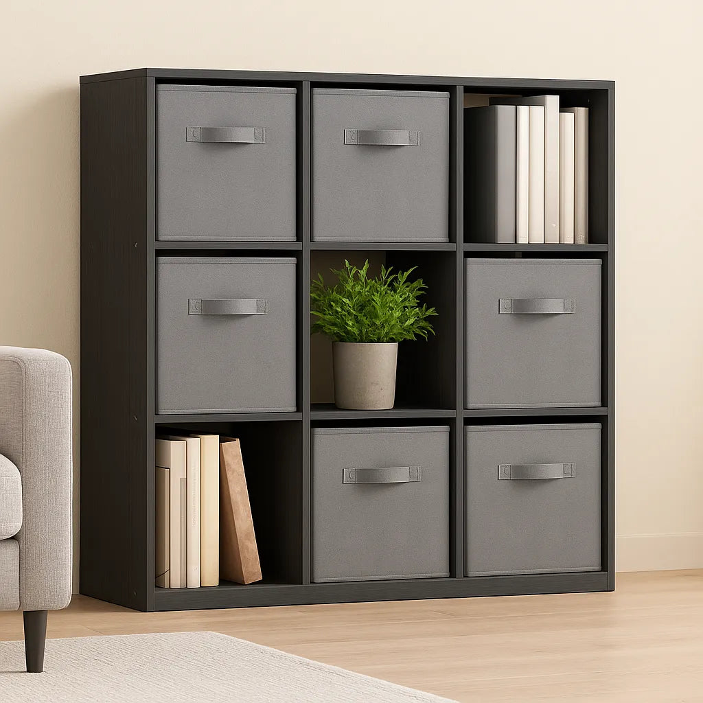 Black storage cube shelf with gray drawers and books in a room setting.