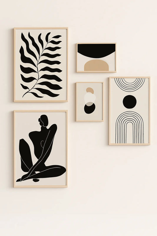 Set of five framed abstract artworks on a white wall