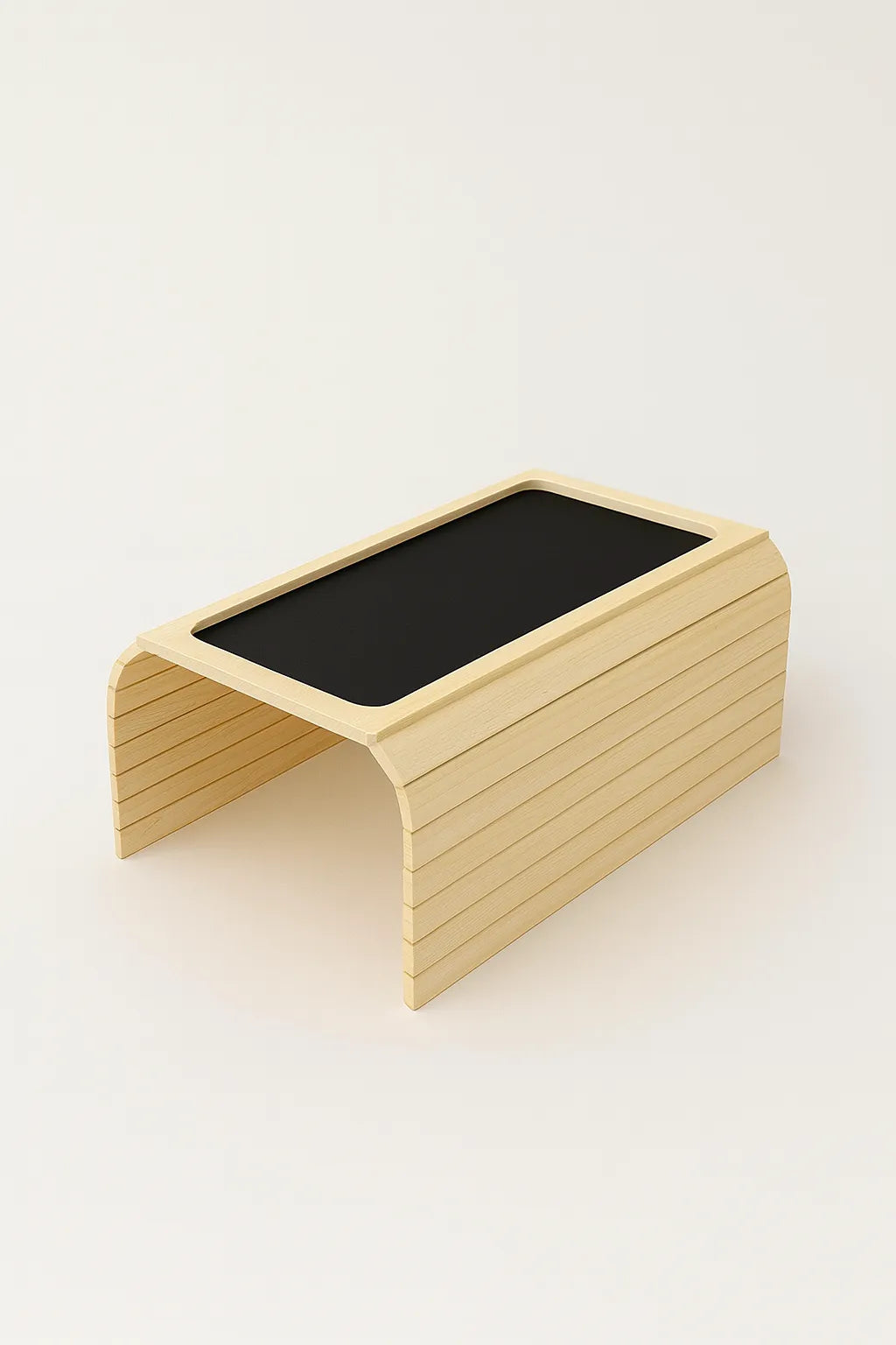 Wooden shelf with a black surface on a white background