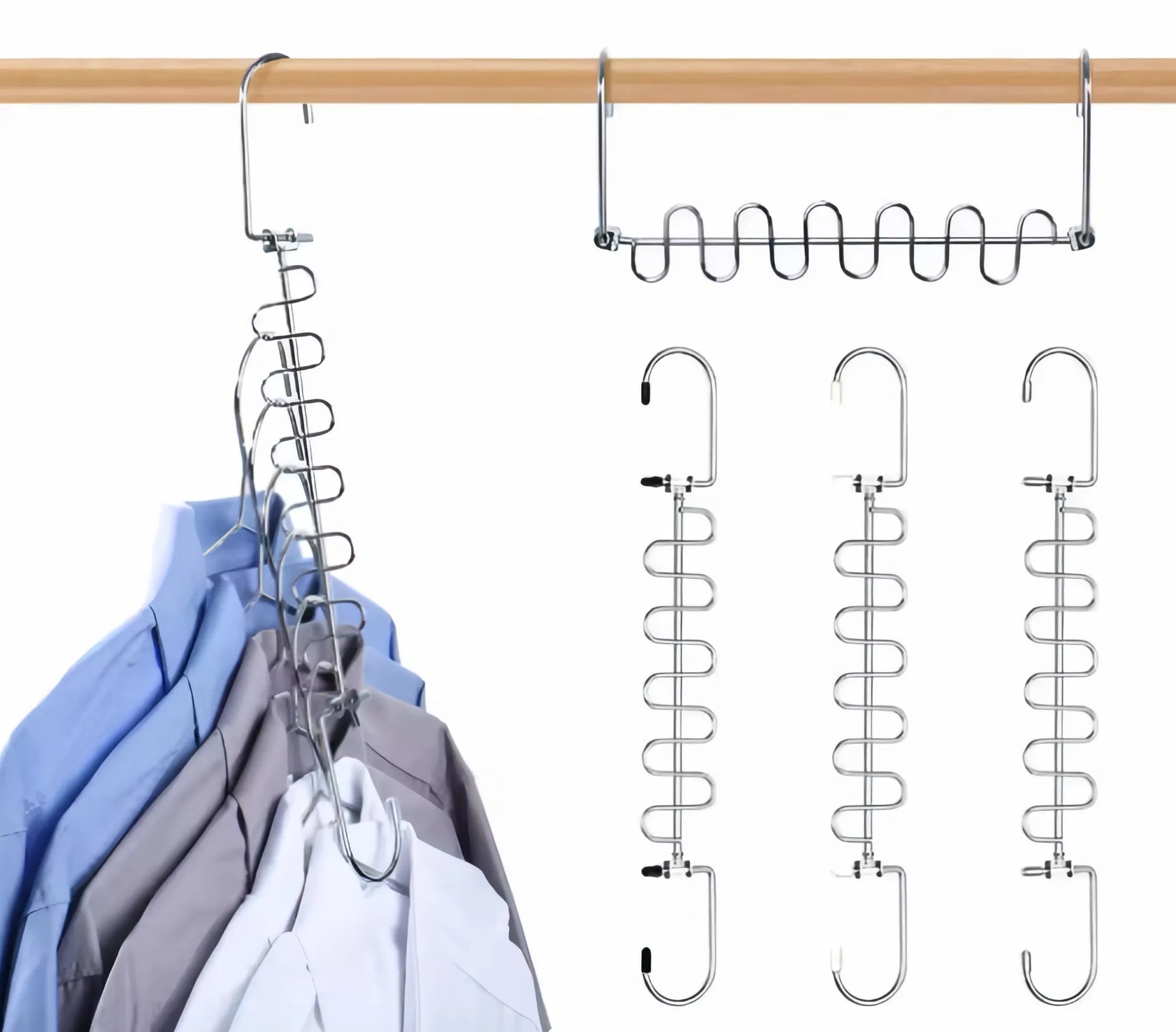Metal spiral hangers on a wooden rod with clothes.