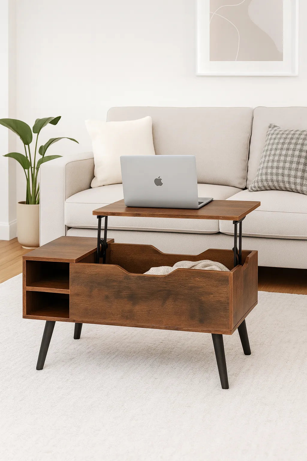 Wooden coffee table with storage compartment and laptop on top, in a living room setting.