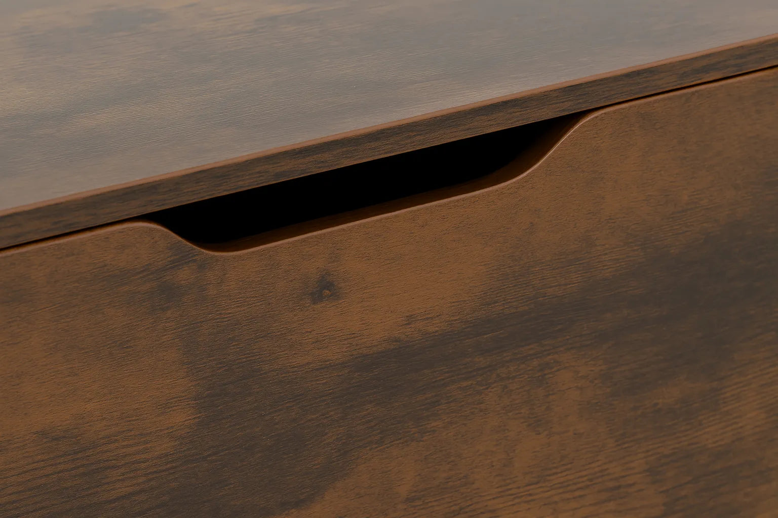Close-up of a wooden surface with a drawer